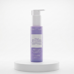 A lavender purple bottle of Arovana Daily Brightening Gel Cleanser with a white pump dispenser, displayed on a white cylindrical pedestal against a clean white background.