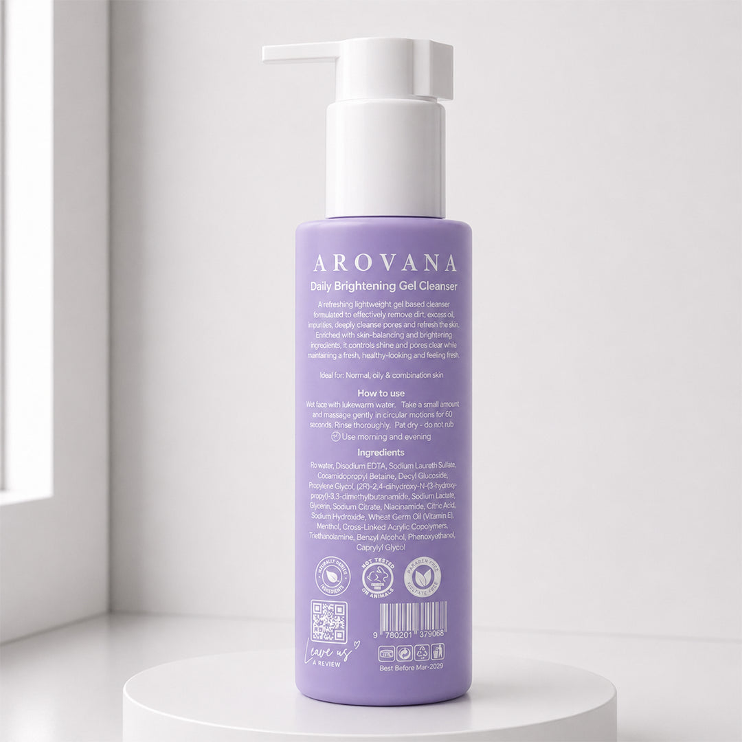 Purple bottle of Arovana cleanser on a white surface with a light gray background