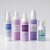 Five AROVANA skincare bottles arranged in a row on a light gray studio background. The bottles include a clear glass skin moisturizer, a clear balance exfoliating toner, a glow tint sun defense SPF 30, a daily brightening gel cleanser, and a pore control moisturizer serum.
